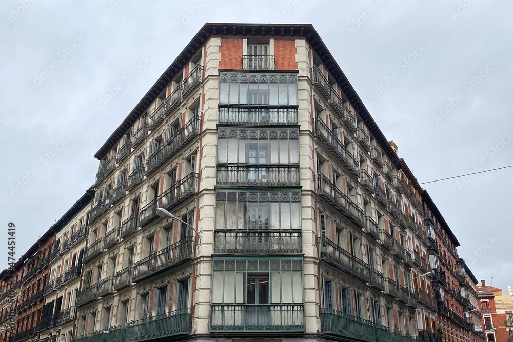 Street corner, old building with balconies Street corner, old building with balconies