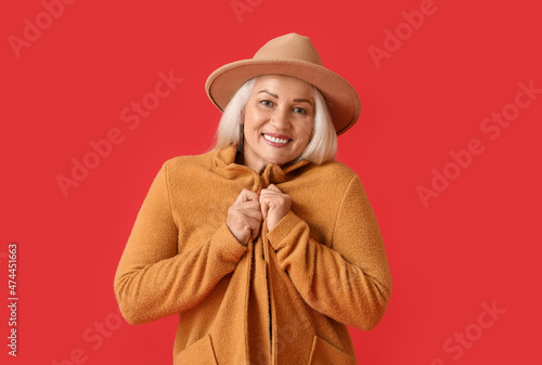 Fashionable mature woman in...