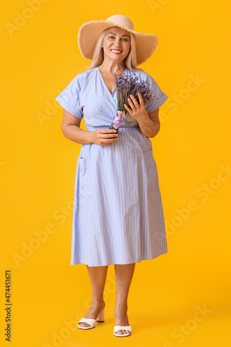 Elegant mature woman in str...