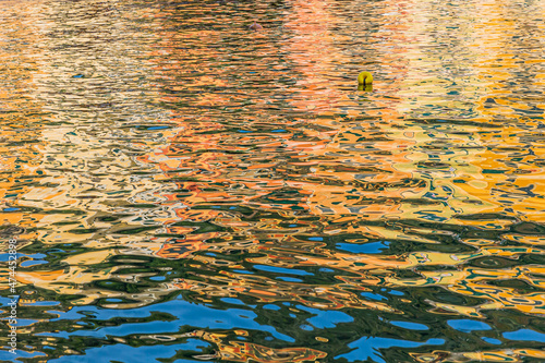 Colours reflected in the waters of Portifino harbour photo