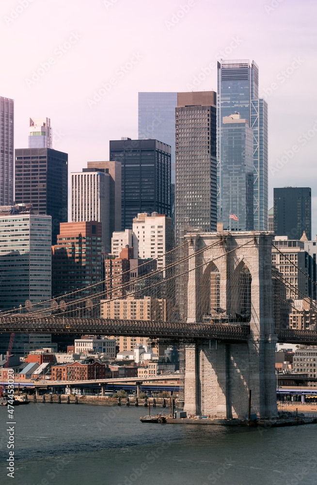Obraz premium New York City skyline Manhattan town panoramic view Brooklyn Bridge World Trade Center. Vertical photo.