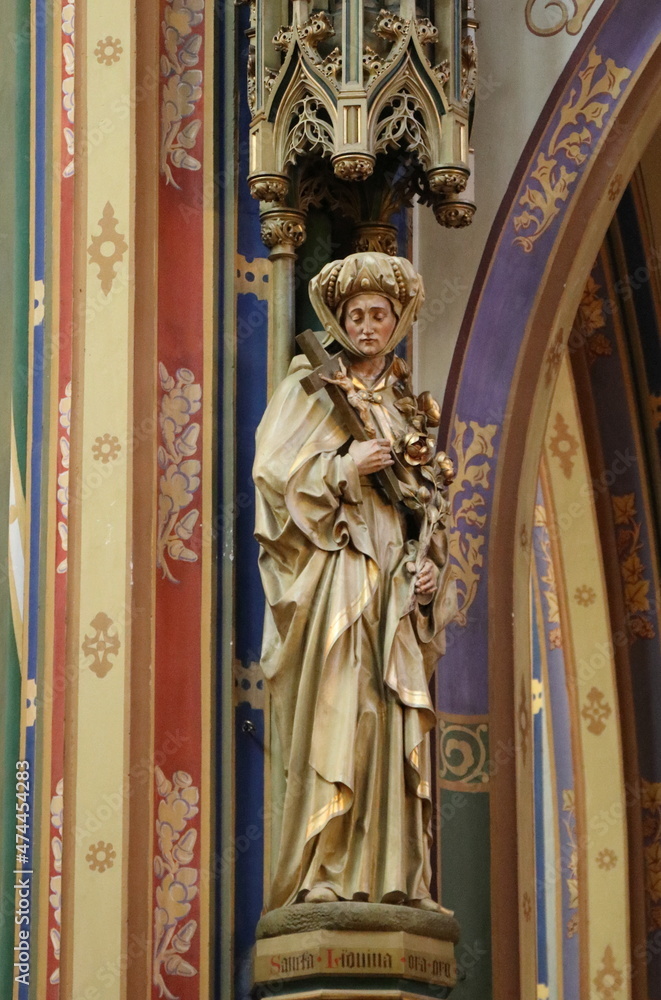 Sculpture of a Woman Saint Holding a Crucifix at the Krijtberg Church in Amsterdam, Holland