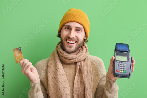Smiling man in winter cloth...