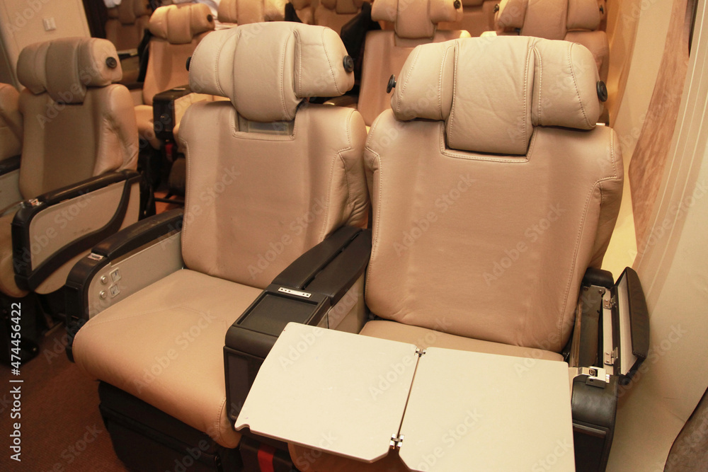 Airplane seat inside an aircraft. Airplane seat inside an aircraft.