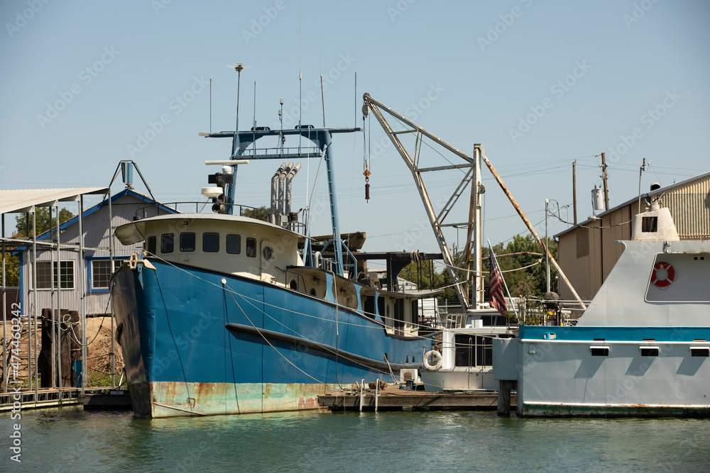 Fototapeta premium Daytime view of the public Marina on the San Joaquin River in Stockton, California, USA.