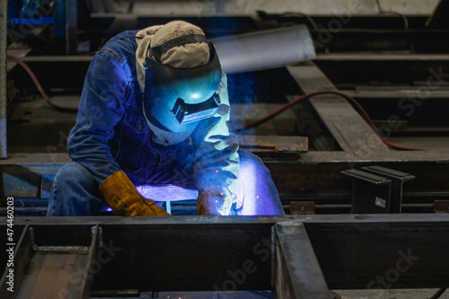 Light steel welders and light shields with welding masks for safety.