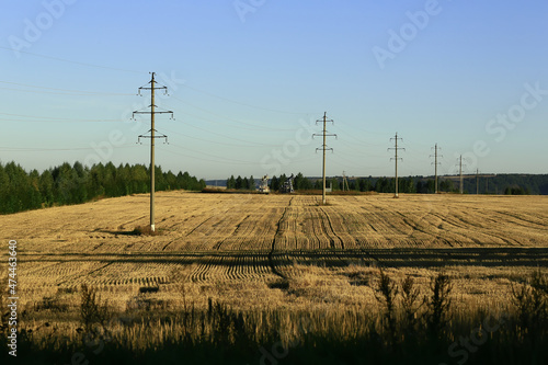 Oil production, field, sky. Oil pumps. Beautiful landscape. Blurred background.