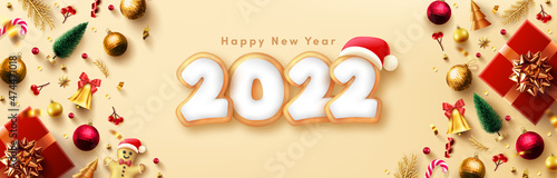 Happy New Year 2022 Poster or banner with Gingerbread cookies in the form of numbers 2022 and christmas element.Banner template for Retail,Shopping,New year or Christmas Promotion.