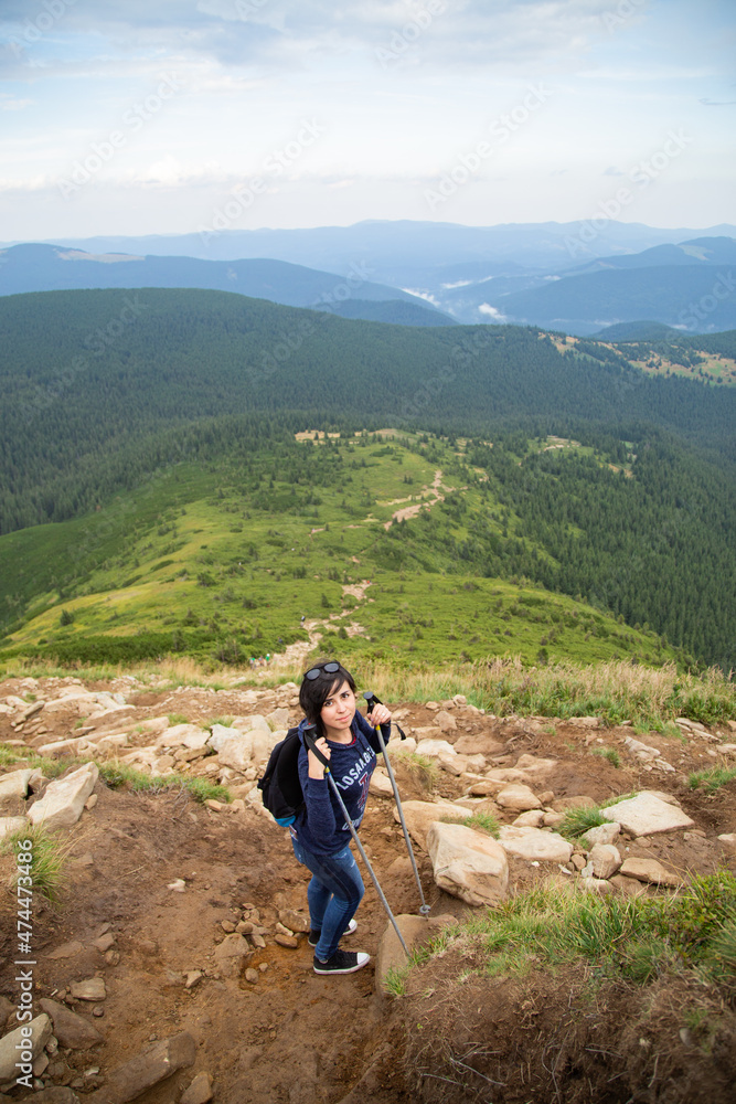 Girl Descend Down a Large Green Mountain Range