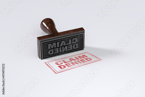 Rubber stamping that says Claim Denied on White Background.