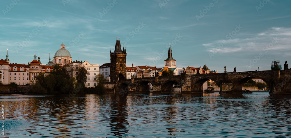 Panoramic view of Charles Bridge on the Vltava river in the center of Prague on a sunny day 2021 during storm Panoramic view of Charles Bridge on the Vltava river in the center of Prague on a sunny day 2021 during storm