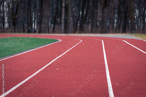 Close-up texture of a running track in a stadium.