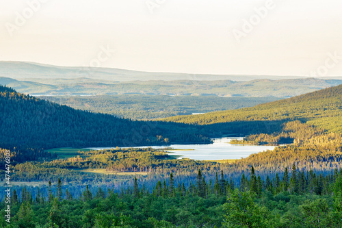 Forest lake in the Nordic wilderness Fototapeta