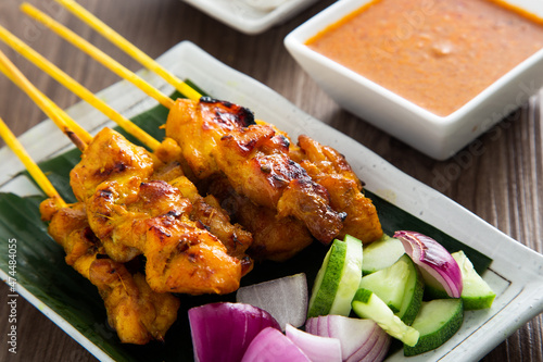 Photos Malaysian chicken satay with delicious peanut sauce.