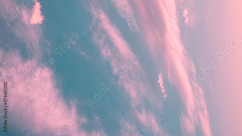 Vertical Shot Light Blue And Pink Cirrus Clouds Cloud Sky. natural cloudscape vertical background. 4K Time Lapse, Timelapse, Time-lapse photo