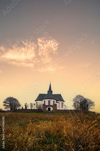 Church in Germany, autumn and winter time with sunset. beautiful landscape shot