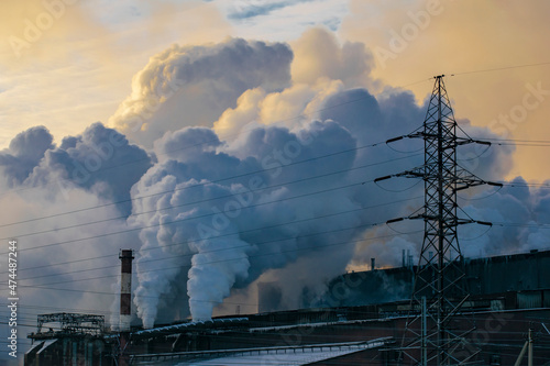 A view of the heavy industry polluting the environment. Ecological concept.