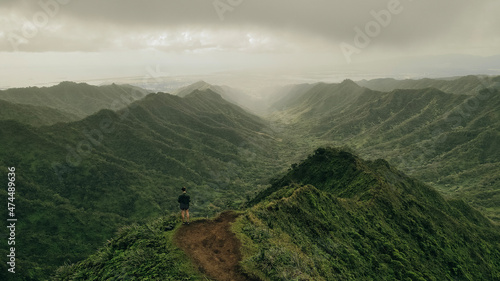 girl on the Mountain top views in Oahu. Moanalua Valley Trail in hawaii