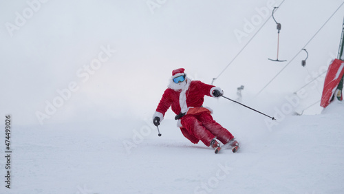 Santa Claus skiing downhill