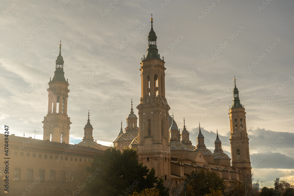 Torres de la Basilica del Pilar from the Ebro river in the city of Zaragoza at sunset, Aragon. Spain Torres de la Basilica del Pilar from the Ebro river in the city of Zaragoza at sunset, Aragon. Spain