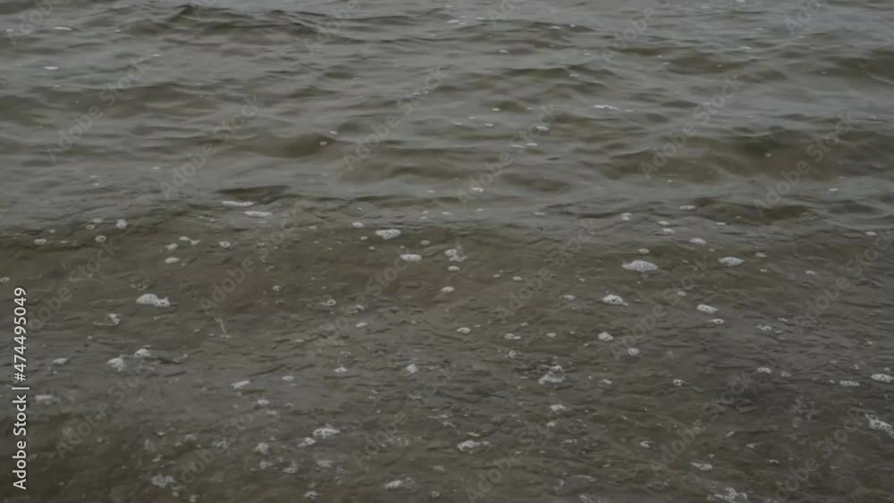 Abstract video of the first ice on lake water in a strong snow storm Abstract video of the first ice on lake water in a strong snow storm