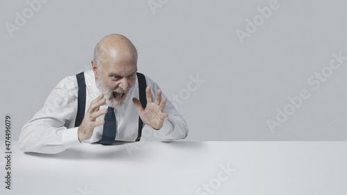 Angry boss shouting out loud photo