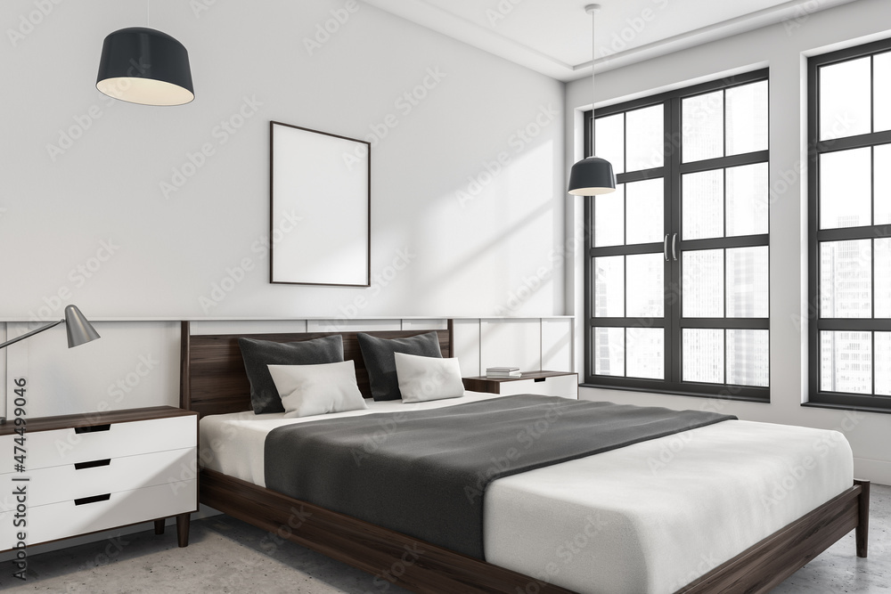 Fototapeta premium Canvas on white wall in bedroom. Corner view.