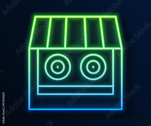 Glowing neon line Shooting gallery icon isolated on blue background. Shooting range. Vector
