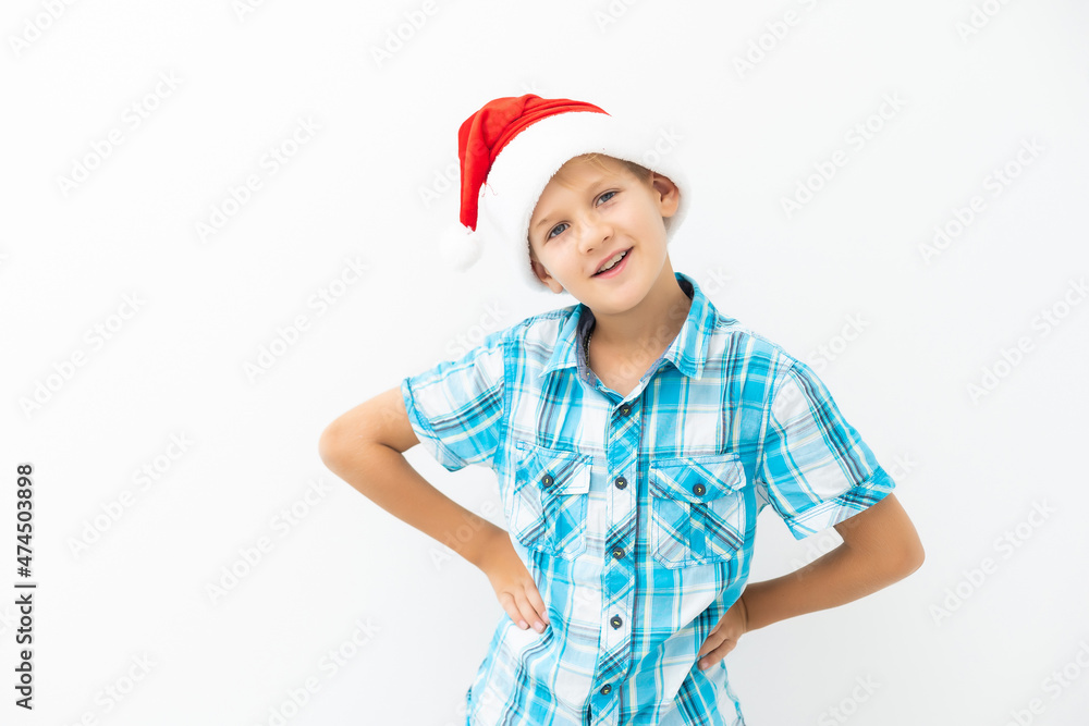 Boy dressed as Santa Claus isolated on white background Boy dressed as Santa Claus isolated on white background