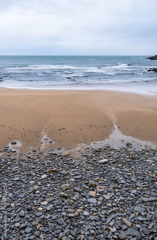 Stones in sand beach