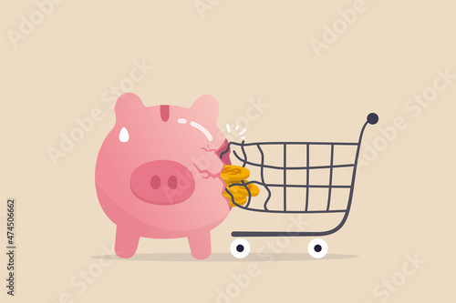 Overspending on shopping online causing debt, poverty, losing money or impact savings, over budget or financial failure concept, shopping cart trolley crash and broke sad saving or budget piggy bank.