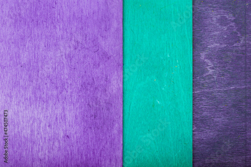 three different colors of wooden panels - purple, turquoise and lavender for the decoration of backdrops and decorations