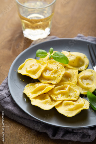 Boiled ravioli with fresh basil