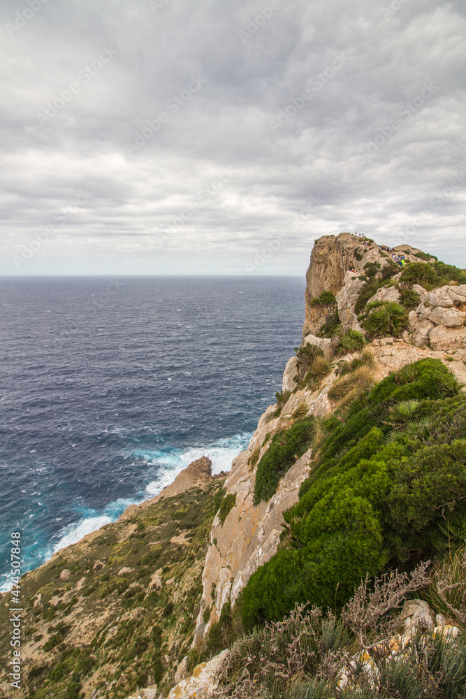 Cabo Formentor (Cape Formentor) at Mallorca, Spain, on a cloudy day in October, wild seascape, rough coastline, cliffs Cabo Formentor (Cape Formentor) at Mallorca, Spain, on a cloudy day in October, wild seascape, rough coastline, cliffs