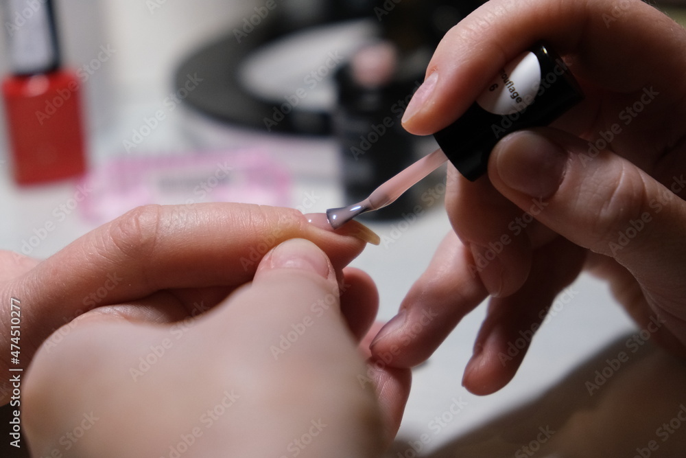 manicurist job done perfectly well the customer is satisfied with beautiful manicured hands manicurist job done perfectly well the customer is satisfied with beautiful manicured hands