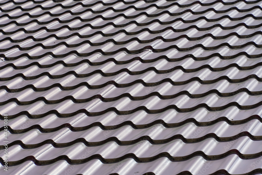 View of the new tiled roof. Blank background for text and design. Exterior of a country house. Copy space View of the new tiled roof. Blank background for text and design. Exterior of a country house. Copy space