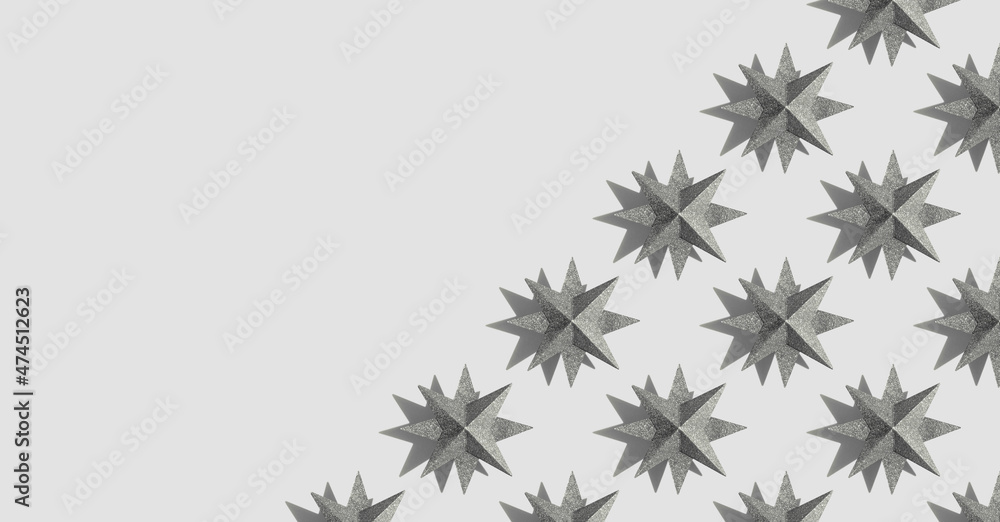 Pattern from glitter silver stars on gray background. Minimal New Year background. Christmas composition. Space for text. Seamless pattern, banner. Greeting card Pattern from glitter silver stars on gray background. Minimal New Year background. Christmas composition. Space for text. Seamless pattern, banner. Greeting card