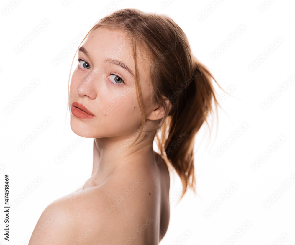Beauty young woman face. Portrait of cute blonde female with fresh clean skin looking at camera. Isolated on white background. Beautiful, spa and skin care concept. Beauty young woman face. Portrait of cute blonde female with fresh clean skin looking at camera. Isolated on white background. Beautiful, spa and skin care concept.
