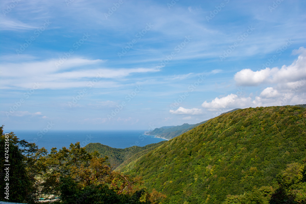 Beautiful sky, sea, rocky coast and mountain landscape in Akita, Tohoku, Japan