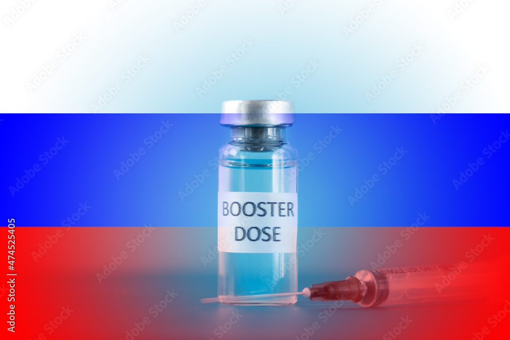 booster dose of coronavirus vaccine on russian flag background,third stage of vaccination in russia booster dose of coronavirus vaccine on russian flag background,third stage of vaccination in russia