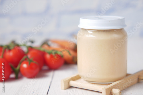 baby food in a container on table with copy space.