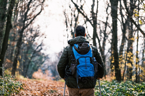 Image of man enjoys hiking in nature.