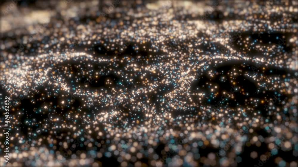 This is a motion stock graphic showing countless glittering gold and blue particles moving randomly. This is a motion stock graphic showing countless glittering gold and blue particles moving randomly.