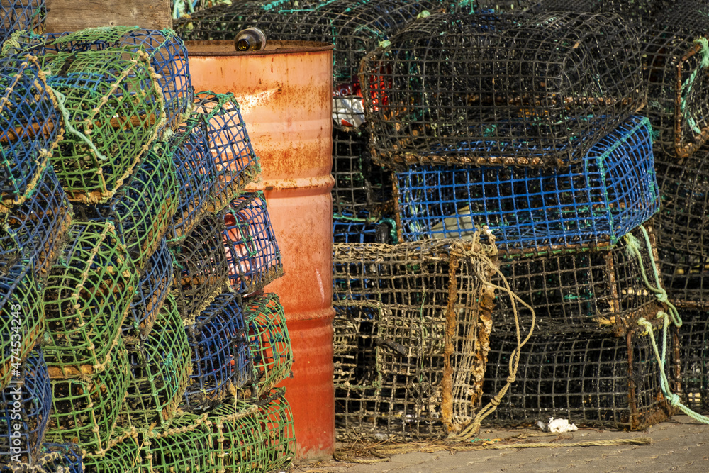 Colorful lobster trap on the quayside of the fishing port of Portimao
