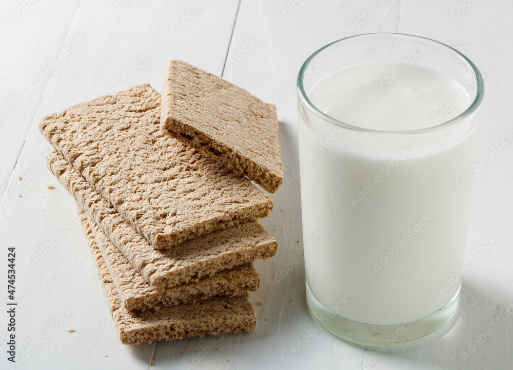 rye bread and a glass of kefir on the table rye bread and a glass of kefir on the table