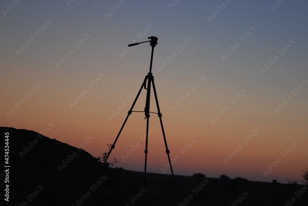 tripod on the background of the passing day
