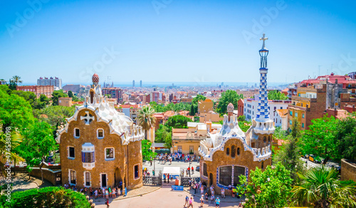 View of the city from beautiful public park Guell in Barcelona, Catalonia, Spain. Cityscape of Barcelona
