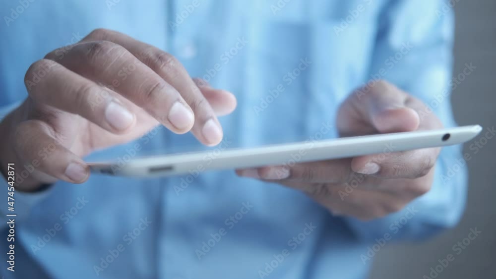 businessman using digital tablet on office desk businessman using digital tablet on office desk