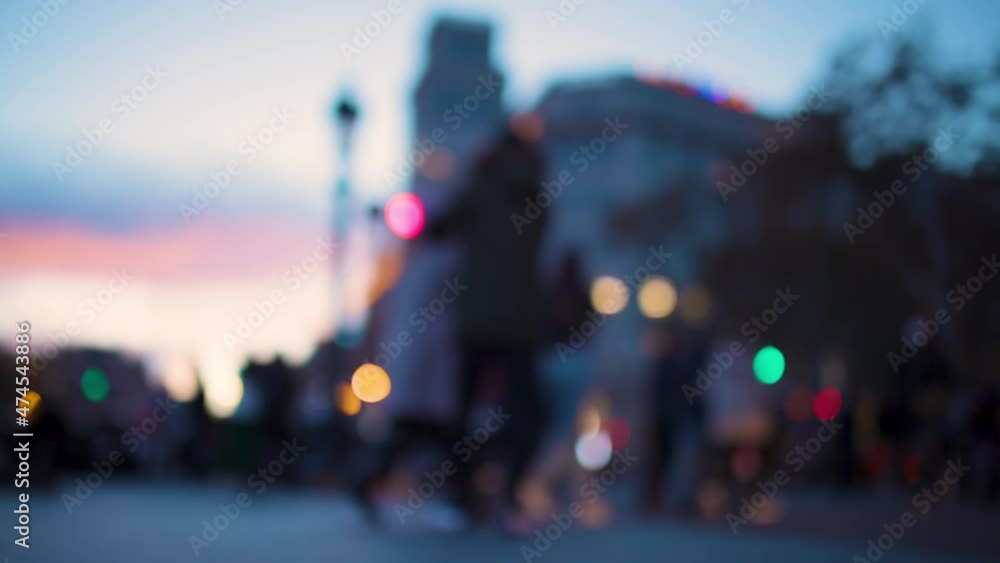 Blurred lights and crowds in city Blurred lights and crowds in city