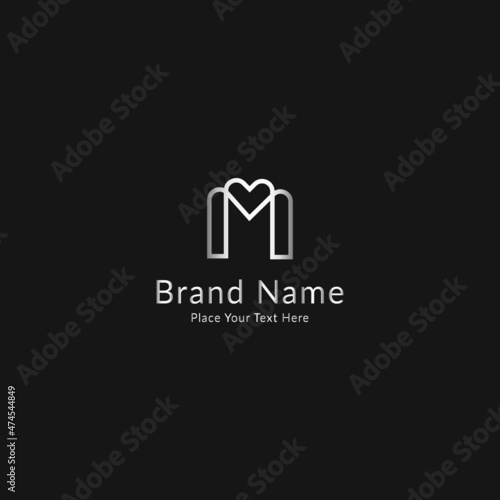 M logo with silver gradient